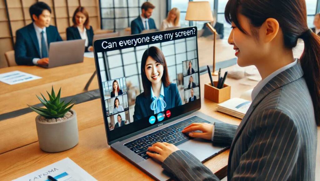 近代的なオフィスで日本人女性がオンライン交渉を行っているシーン。彼女はノートパソコンの前に座り、「Can everyone see my screen?」と尋ねている。画面には他の参加者が表示されている。